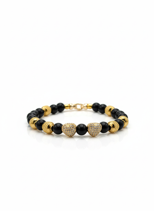 Bracciale “Black Heart Luxe” con Perle Nere e Dettagli Dorati